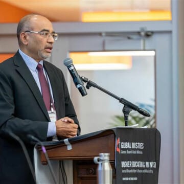 General Secretary Roland Fernandes gives his report to the General Board of Global Ministries and the General Board of Higher Education and Ministry.